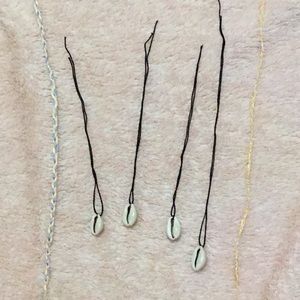 Homemade shell necklaces- braided bracelets